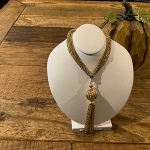 Gold tone tassel necklace